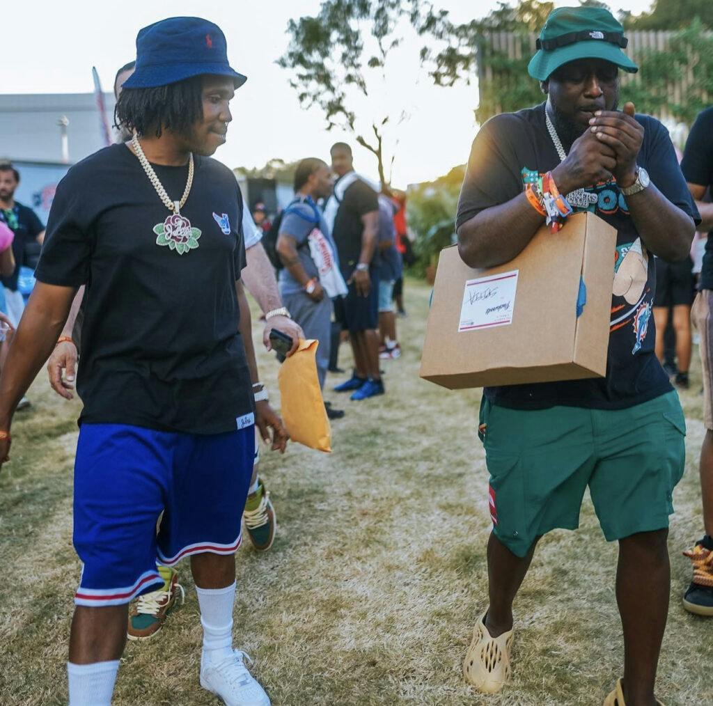 Rapper Curren$y (left) and Shiest Bubz (right) enjoy a smoke break. (Instagram / @adonisisbored)